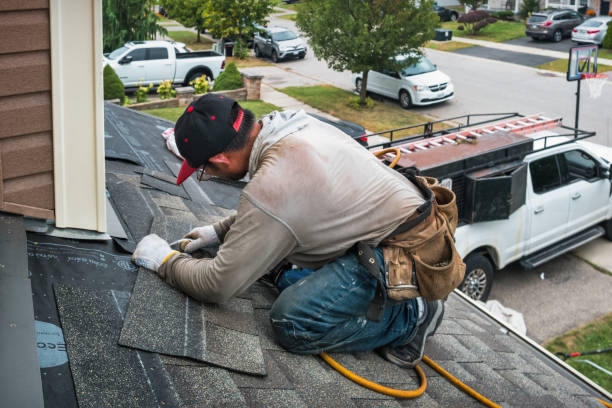 Professional Roofing technician working in Bloomington, IN